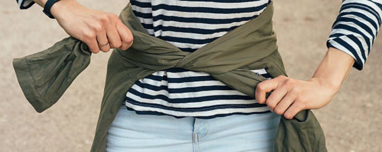 Knotting at the Waist for a Casual Look